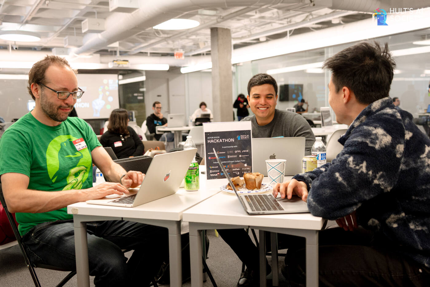 Students coding at a hackathon