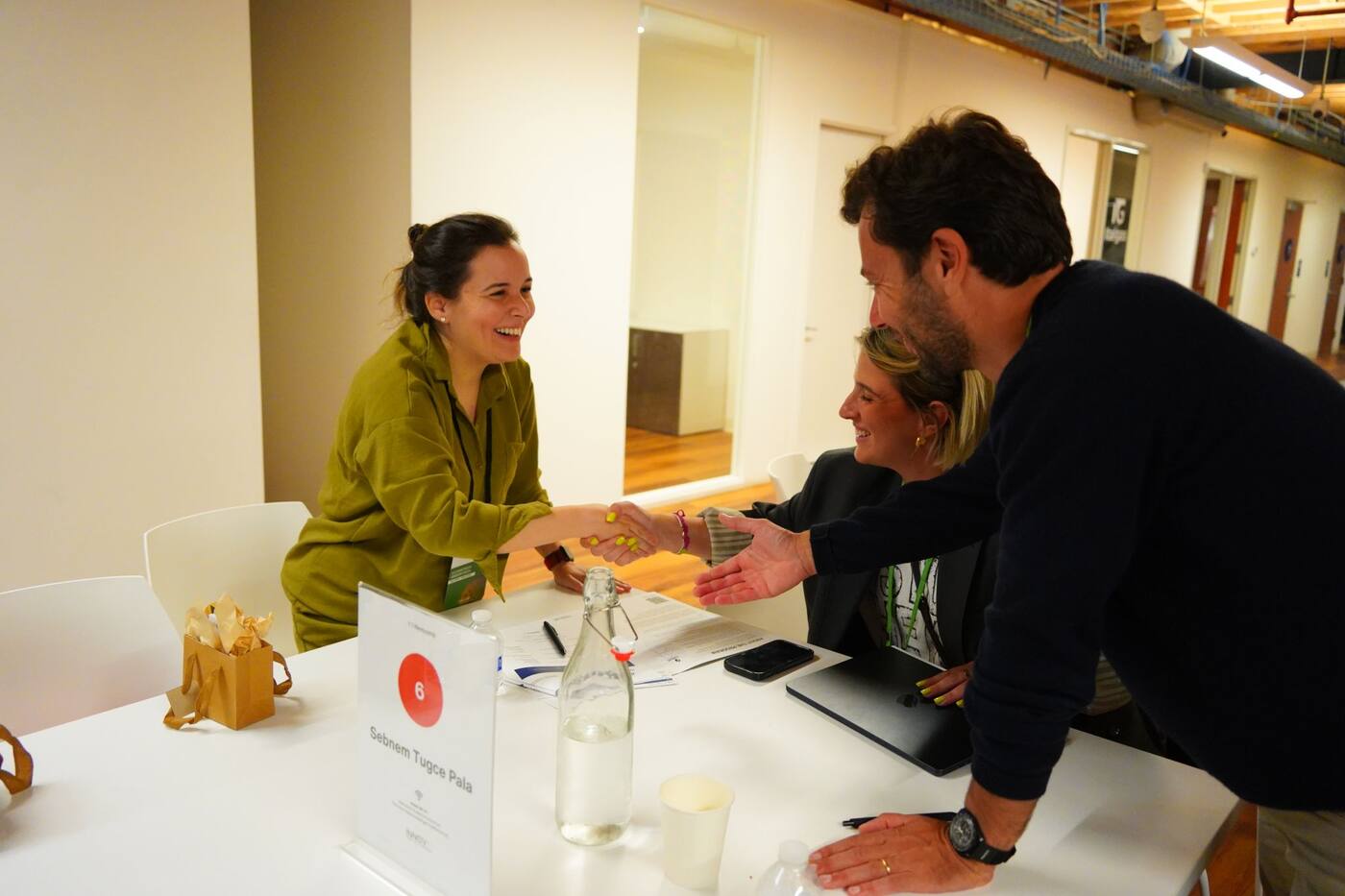 One-to-one meeting at a table