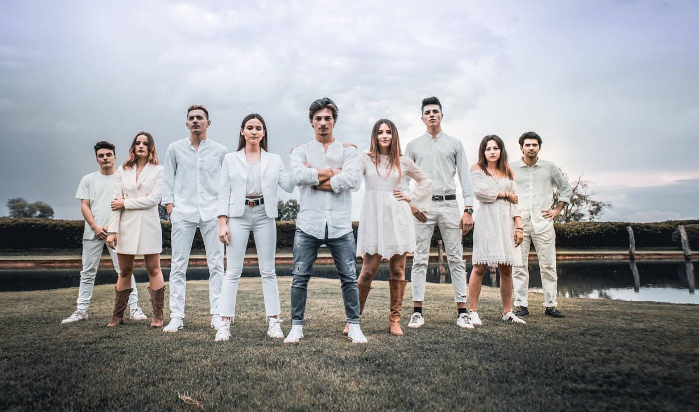 The Veritas team dressed in white
